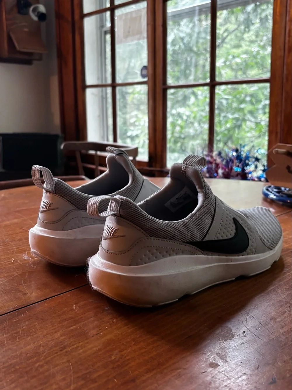 Nike Light Gray/White Slip-On Sneakers with Black Swoosh
